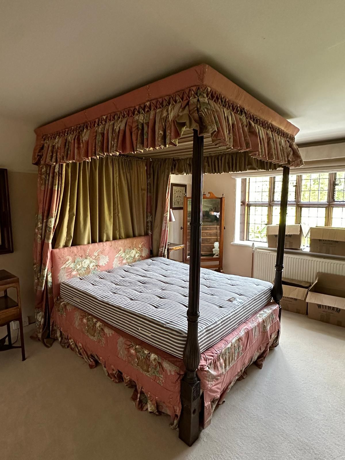 A George III style mahogany four poster bedstead